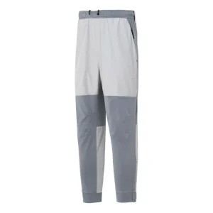 Nike Unlimited Water-Repellent Zippered Cuff Versatile Pants Asia Sizing 'Grey White' FB8602-084